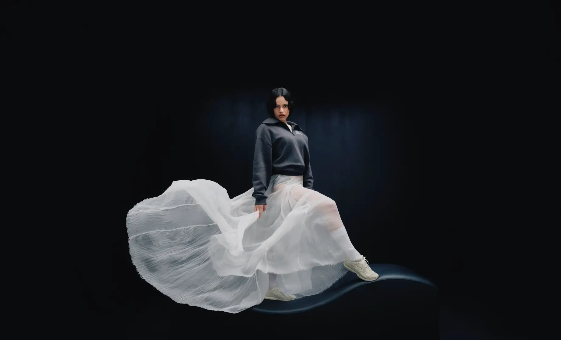 ROSALIA FRONTS NEW BALANCE 204L CAMPAIGN image about the New Balance 204L sneaker campaign featuring Rosalia. The text covers release details, pricing, shoe materials, and design specifications. (image 1 of 4)