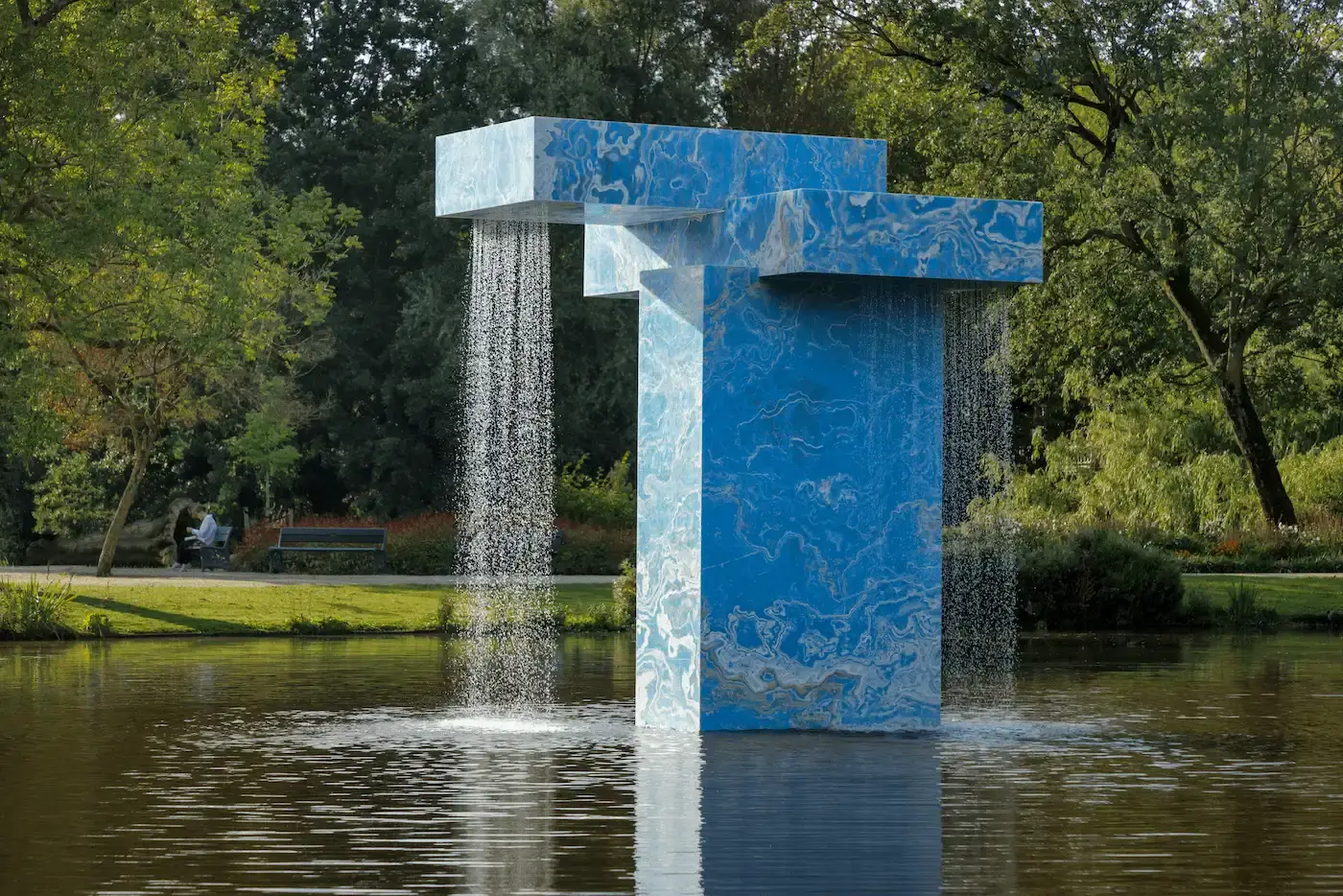 Vondel Fountain, Stacked: A large, striking fountain made of stacked, recycled onyx slabs located in one of the lakes in Amsterdam's Vondelpark. Water cascades from two sides, creating a soothing, relaxing sound Courtesy of Solidnature
