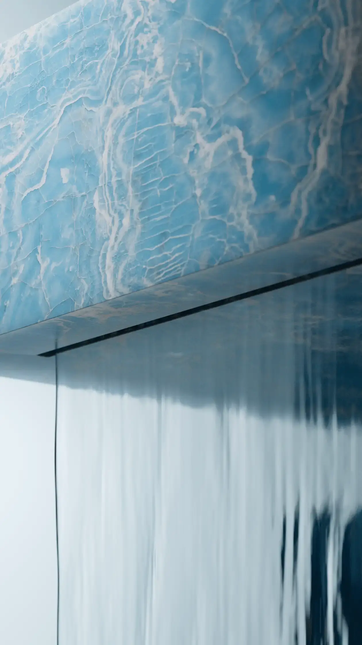 Vondel Fountain, Stacked: A large, striking fountain made of stacked, recycled onyx slabs located in one of the lakes in Amsterdam's Vondelpark. Water cascades from two sides, creating a soothing, relaxing sound (image 2 of 2)