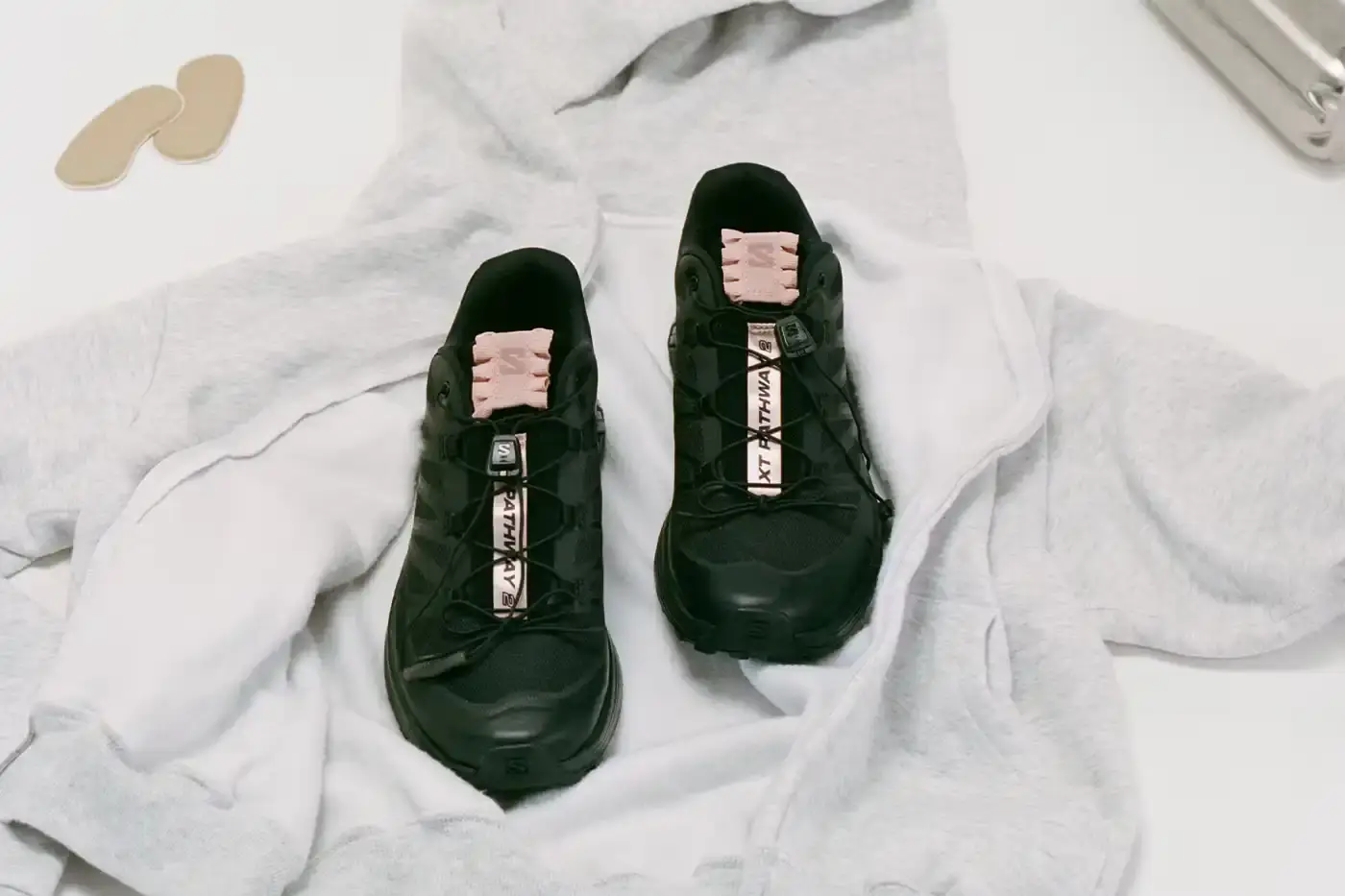 SALOMON LAUNCHES SATIN CAPSULE COLLECTION Salomon releases ballet-inspired shoe collection featuring satin materials and decorative elements on three classic models. (image 3 of 7)