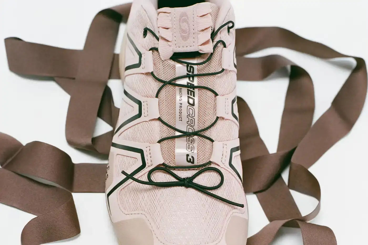 SALOMON LAUNCHES SATIN CAPSULE COLLECTION Salomon releases ballet-inspired shoe collection featuring satin materials and decorative elements on three classic models. (image 5 of 7)