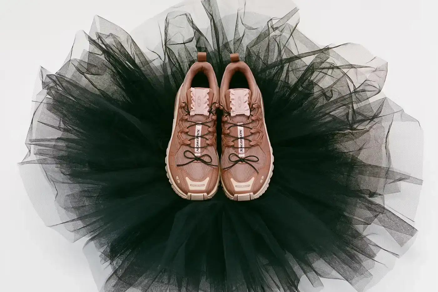 SALOMON LAUNCHES SATIN CAPSULE COLLECTION Salomon releases ballet-inspired shoe collection featuring satin materials and decorative elements on three classic models. (image 2 of 7)