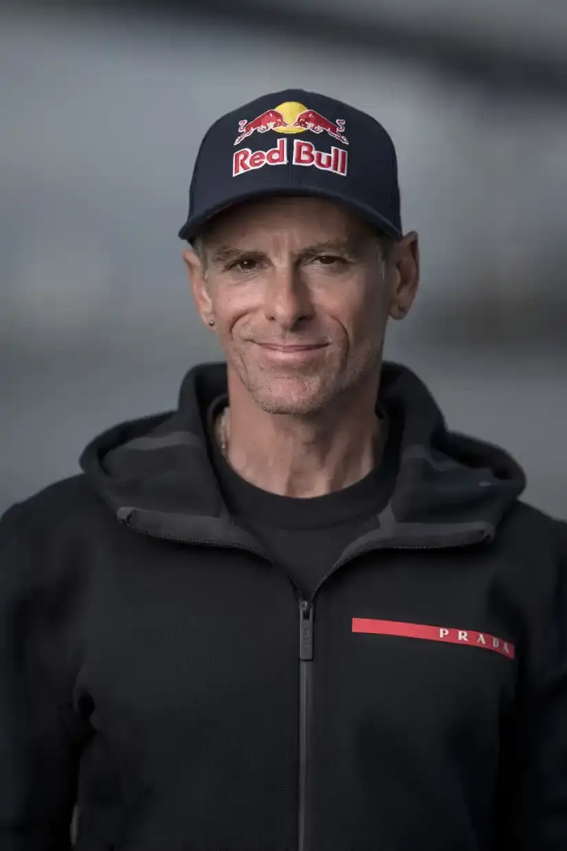 image of Professional skysurfer Sean MacCormac performs historic stunt gliding across San Francisco Bay Bridge cables after helicopter jump, supported by Prada Linea Rossa and Red Bull partnership. (image 2 of 2)