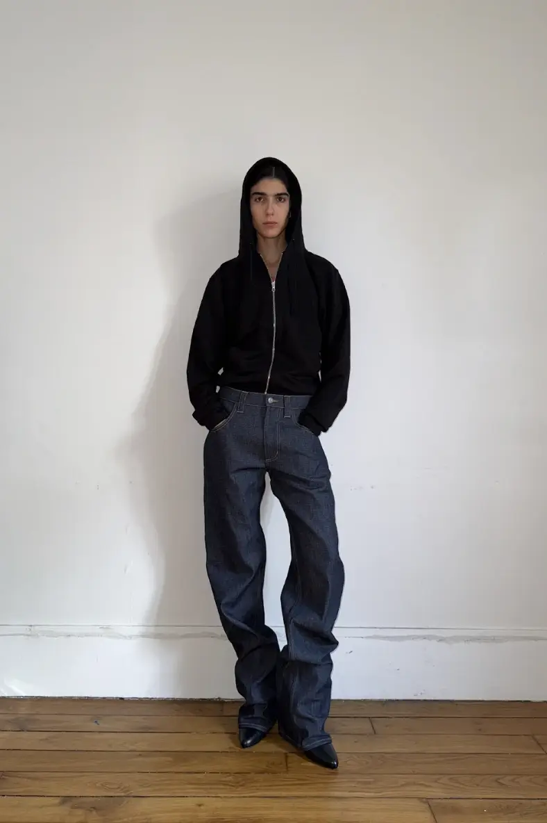 SECONDA PARIS AND THE POWER OF SECOND CHANCES IN FASHION Portrait of Seconda Paris founders Andrea Bertazzon and Marco Marino in a minimalist studio setting, reflecting a professional yet grounded atmosphere. (image 8 of 10)