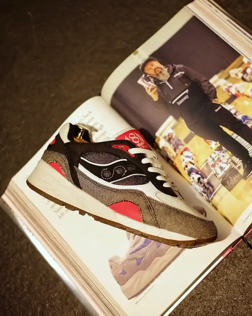 image of Sergey Vetrov, a dedicated Saucony sneaker collector with over 800 pairs. It traces his journey from first discovering the brand in the late '80s to becoming a guardian of its heritage. The piece explores how his collection represents more than footwear—it embodies personal history, community connections, and authentic passion in contrast to fleeting trends. Special focus is given to the challenges he's overcome and the significance of the Shadow 6000 "Invictus" collaboration in connecting him with a global community of enthusiasts. (image 2 of 5)