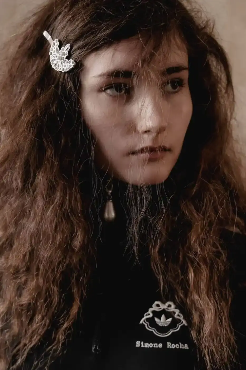 SIMONE ROCHA AND ADIDAS FW26 COLLECTION DETAILS A descriptive report on the design elements and product types included in the Simone Rocha and adidas Fall/Winter 2026 fashion collaboration. (image 4 of 11)