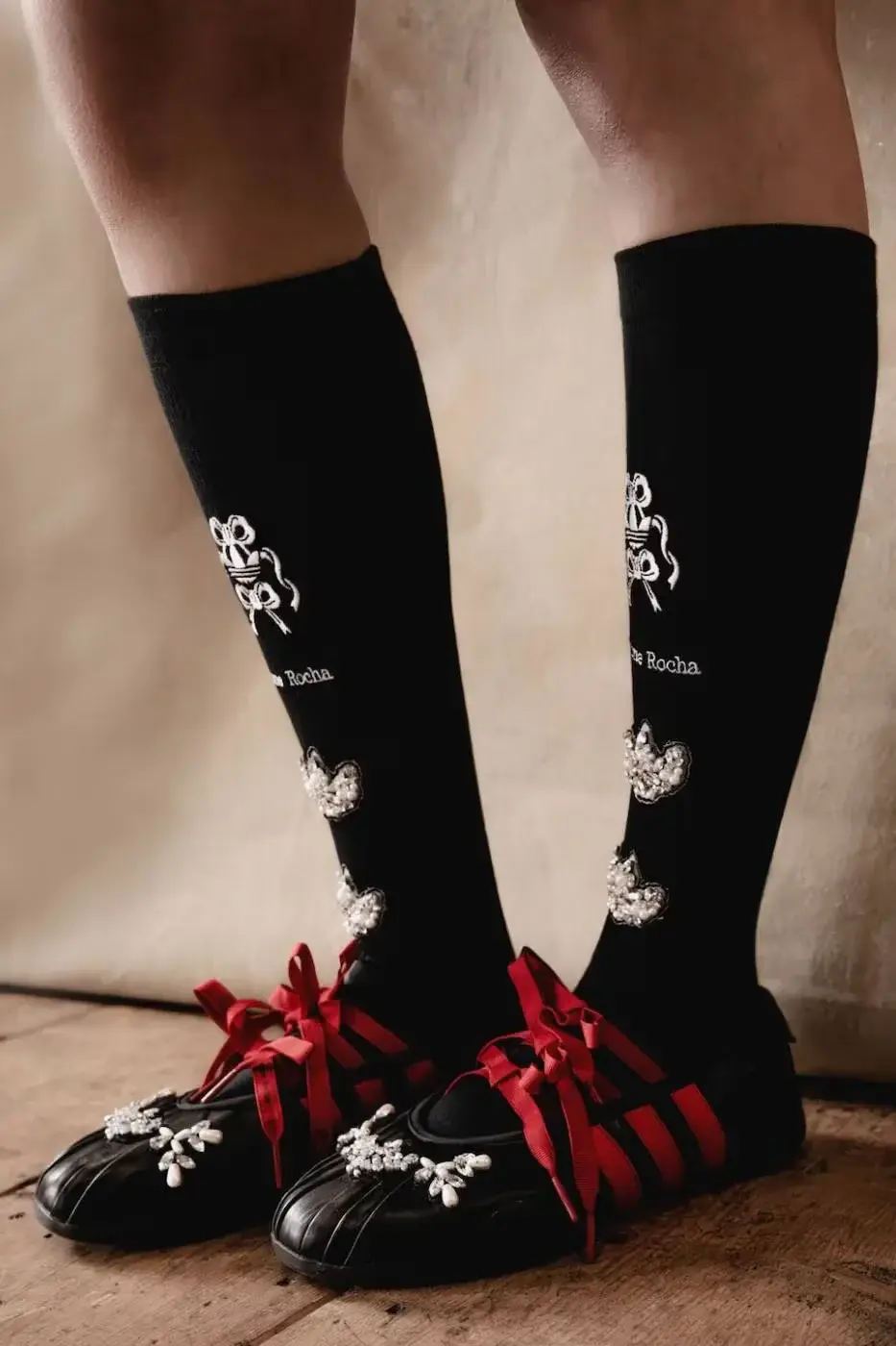 SIMONE ROCHA AND ADIDAS FW26 COLLECTION DETAILS A descriptive report on the design elements and product types included in the Simone Rocha and adidas Fall/Winter 2026 fashion collaboration.