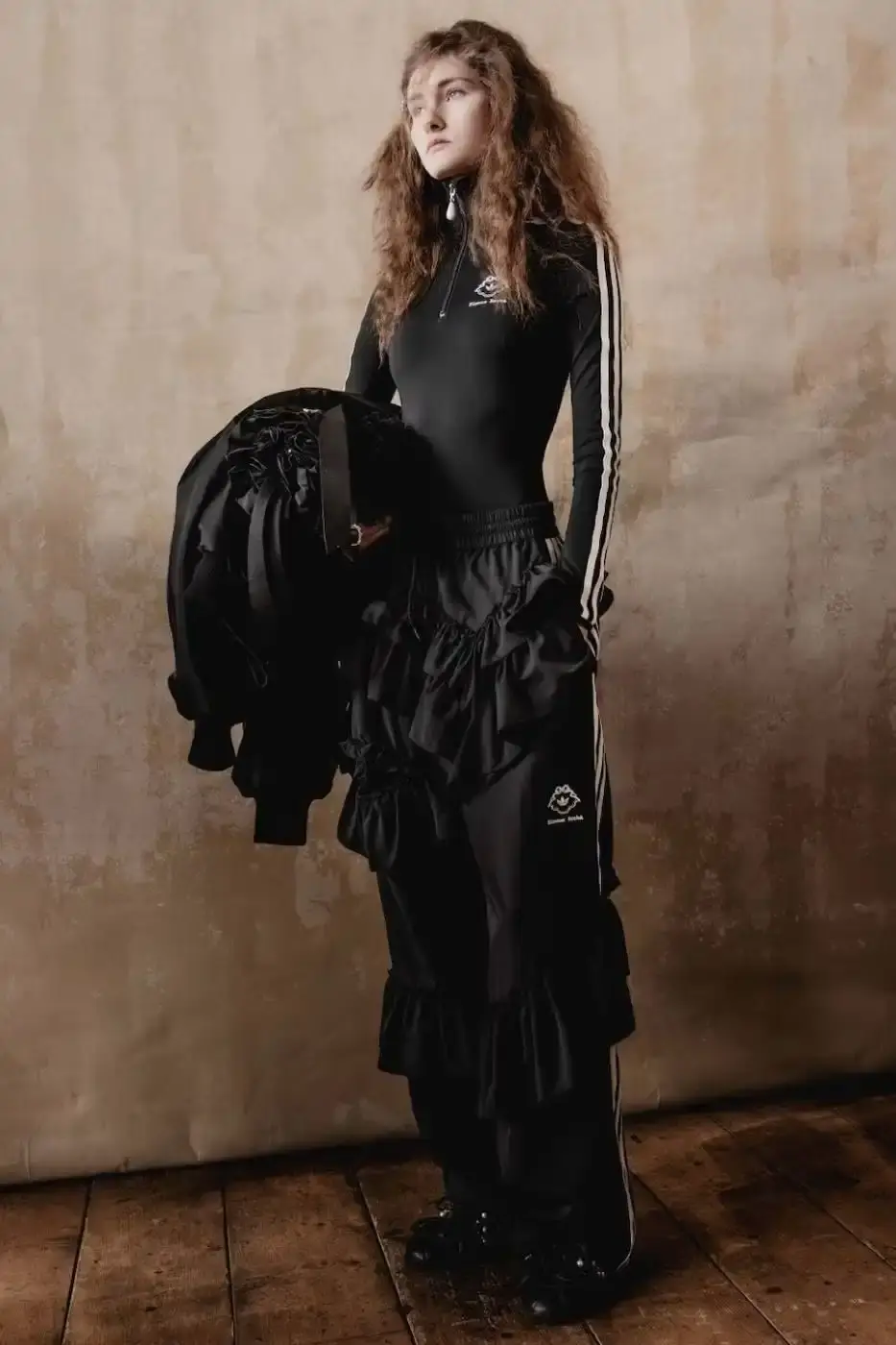 SIMONE ROCHA AND ADIDAS FW26 COLLECTION DETAILS A descriptive report on the design elements and product types included in the Simone Rocha and adidas Fall/Winter 2026 fashion collaboration. (image 3 of 11)