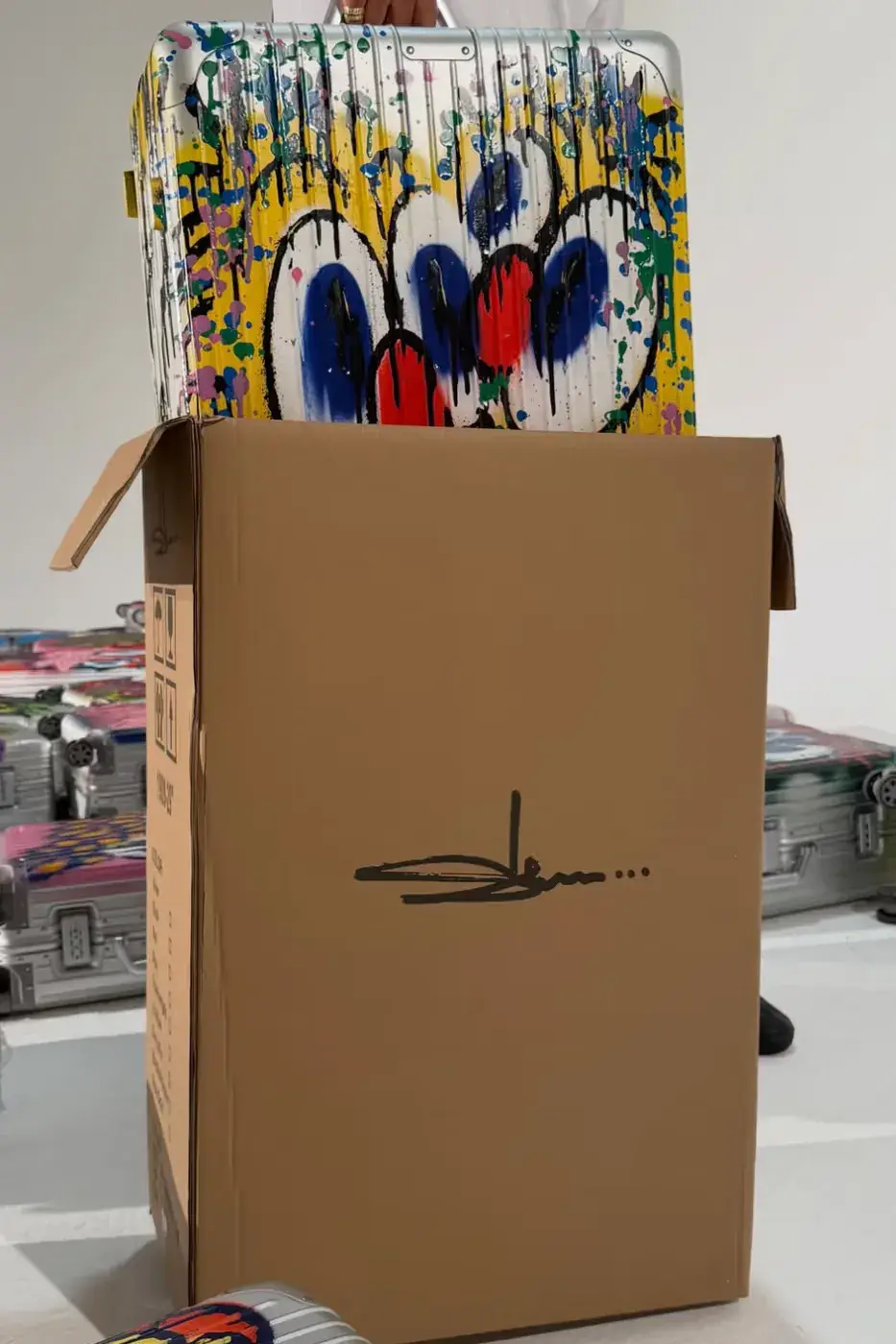 SLAWN TEASES RIMOWA SUITCASE COLLABORATION Image of an article about artist Olaolu Slawn teasing a graffiti-styled luggage collaboration with RIMOWA. (image 7 of 7)