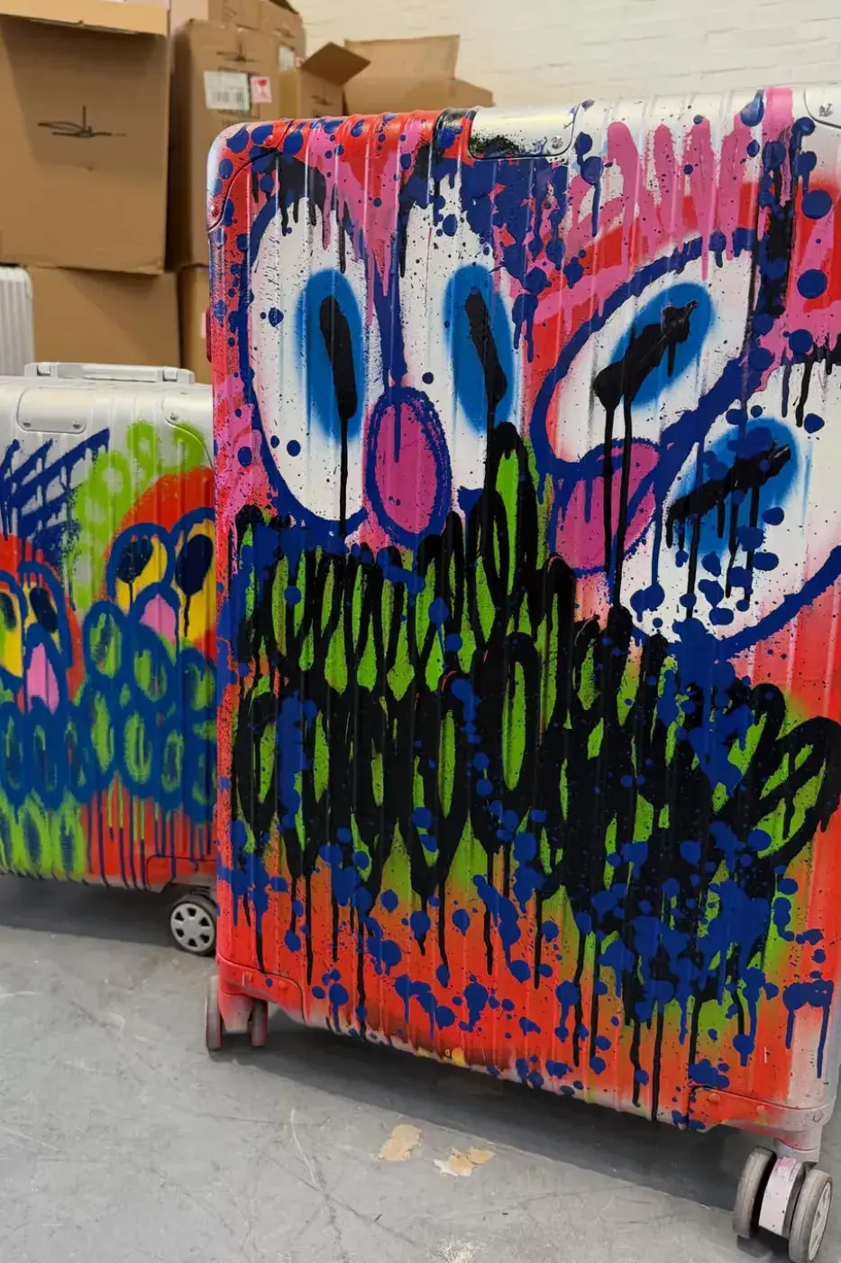 SLAWN TEASES RIMOWA SUITCASE COLLABORATION Image of an article about artist Olaolu Slawn teasing a graffiti-styled luggage collaboration with RIMOWA. (image 6 of 7)