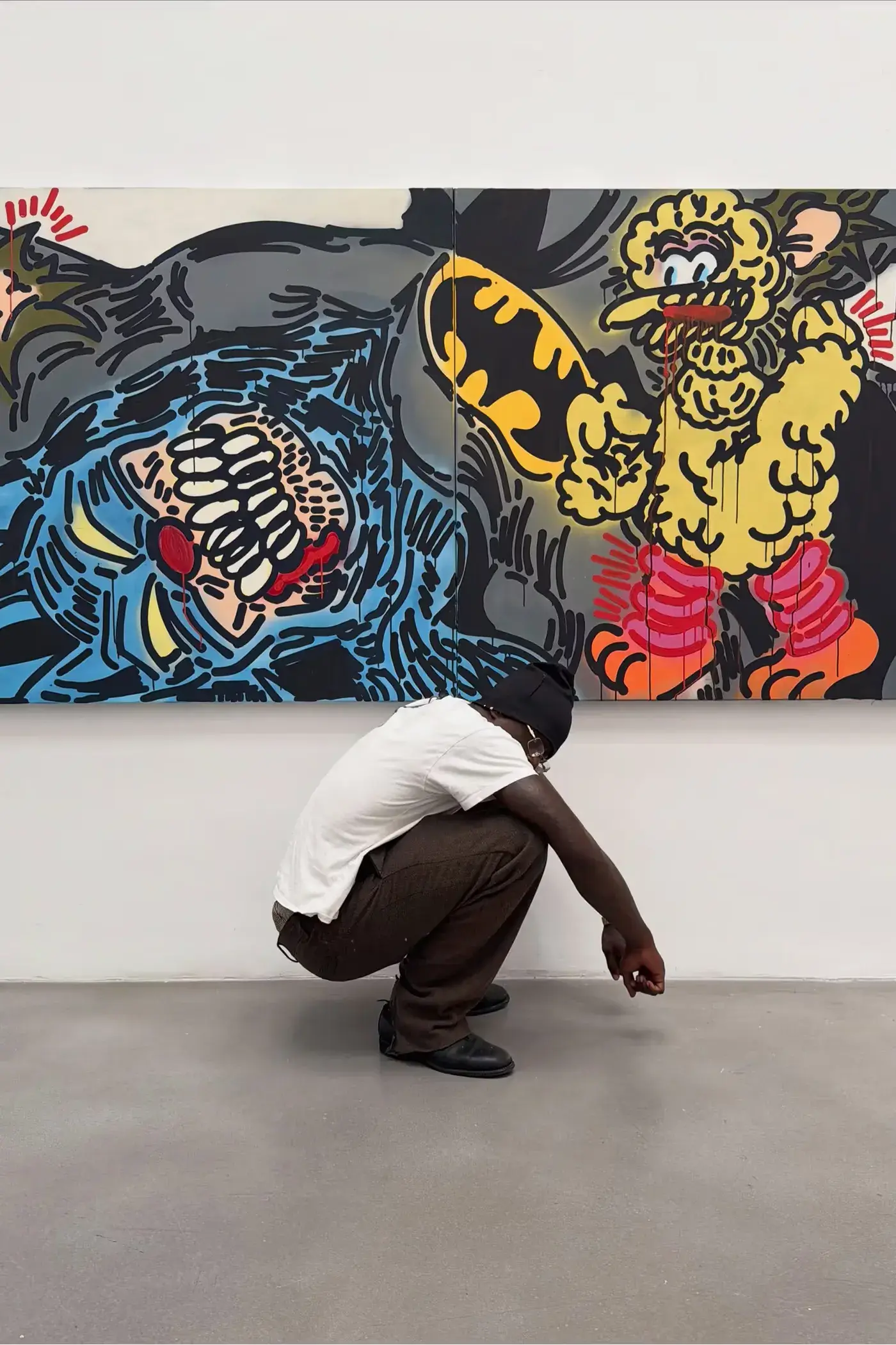 SLAWN EXHIBITION OPENS IN CHELSEA NEW YORK image description detailing London artist Olaolu Slawn's debut New York pop up art exhibition including large scale paintings and sportswear apparel. (image 6 of 14)