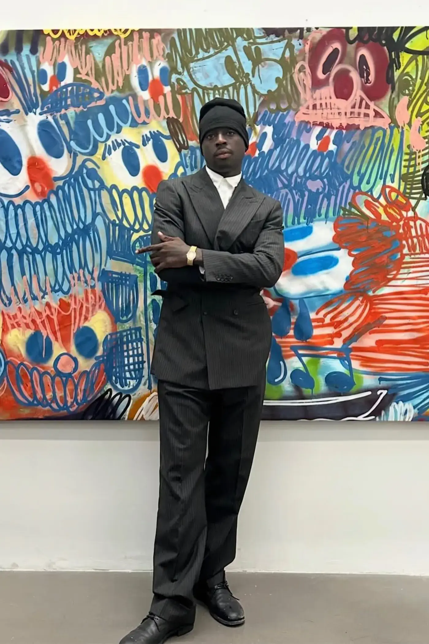SLAWN EXHIBITION OPENS IN CHELSEA NEW YORK image description detailing London artist Olaolu Slawn's debut New York pop up art exhibition including large scale paintings and sportswear apparel. (image 10 of 14)