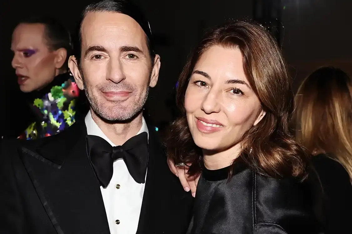 image reports on Sofia Coppola's first documentary film about fashion designer Marc Jacobs, scheduled to premiere at the Venice Film Festival in September 2025. The piece covers their three-decade creative partnership, the film's 97-minute runtime, and their collaborative history spanning advertising campaigns and fashion projects. The documentary uses archival footage to examine Jacobs' career development and his relationship with the filmmaker, dating back to their 1992 meeting after his controversial Perry Ellis collection.