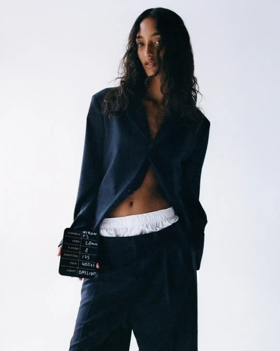 STILL KELLY DROPS SECOND COLLECTION image about Still Kelly's second menswear collection by Marc Kalman, featuring 37 pieces including workwear, denim, and graphic tees with punk and pop influences. (image 2 of 5)