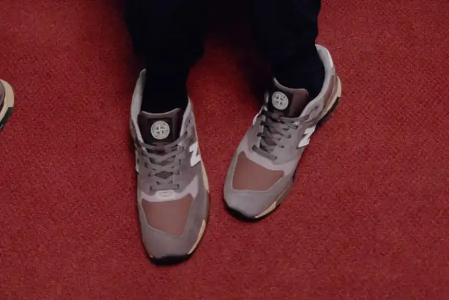 Stone Island/New Balance New Balance 998 sneakers redesigned by Stone Island, featuring polyurethane-coated cotton canvas in mauve, plum, and copper tones with reflective details. (image 2 of 7)