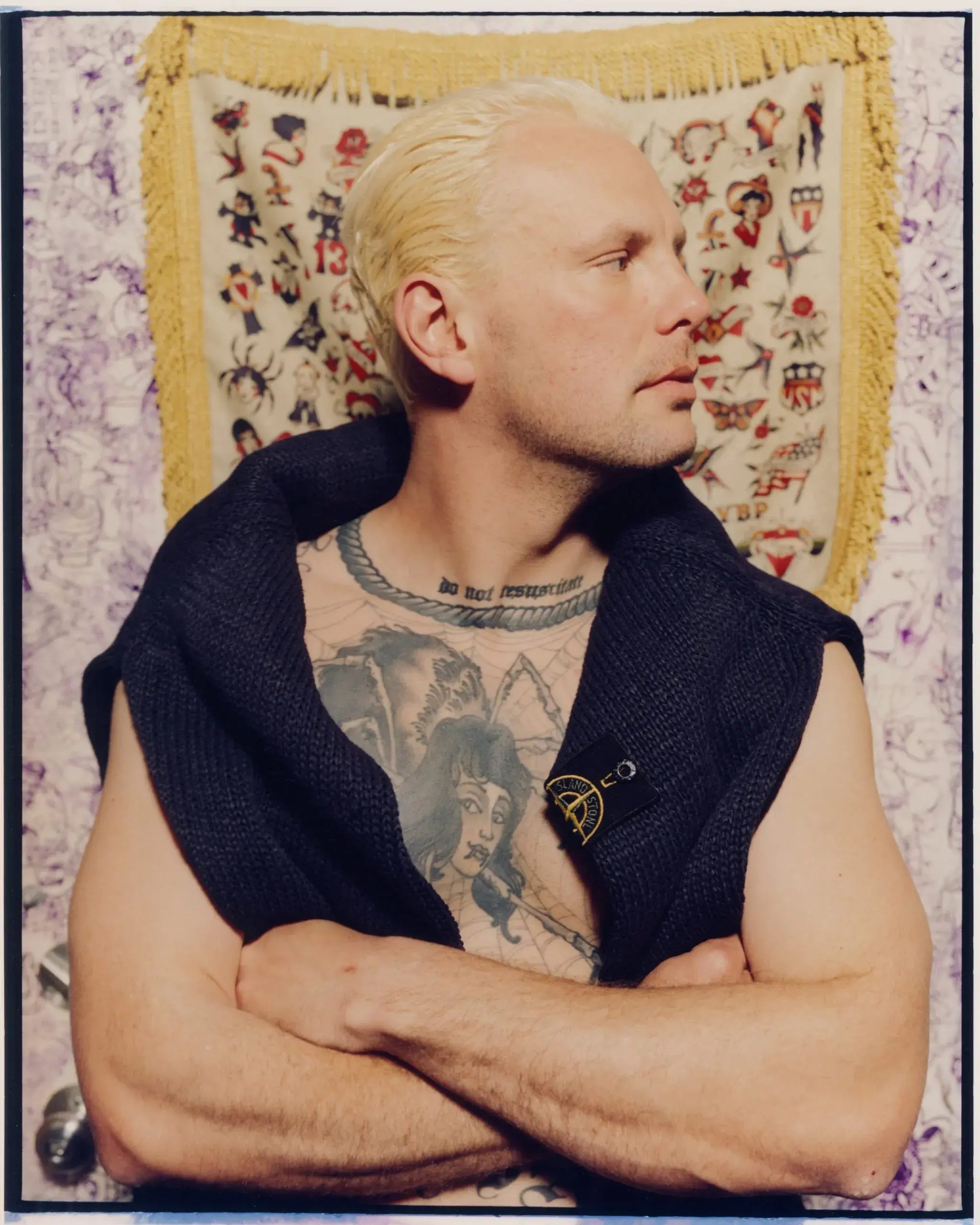 STONE ISLAND HARDCORE SUBCULTURE PROJECT image of photograph collection detailing musicians wearing vintage and modern Stone Island outerwear on tour across North America and Europe. (image 6 of 8)