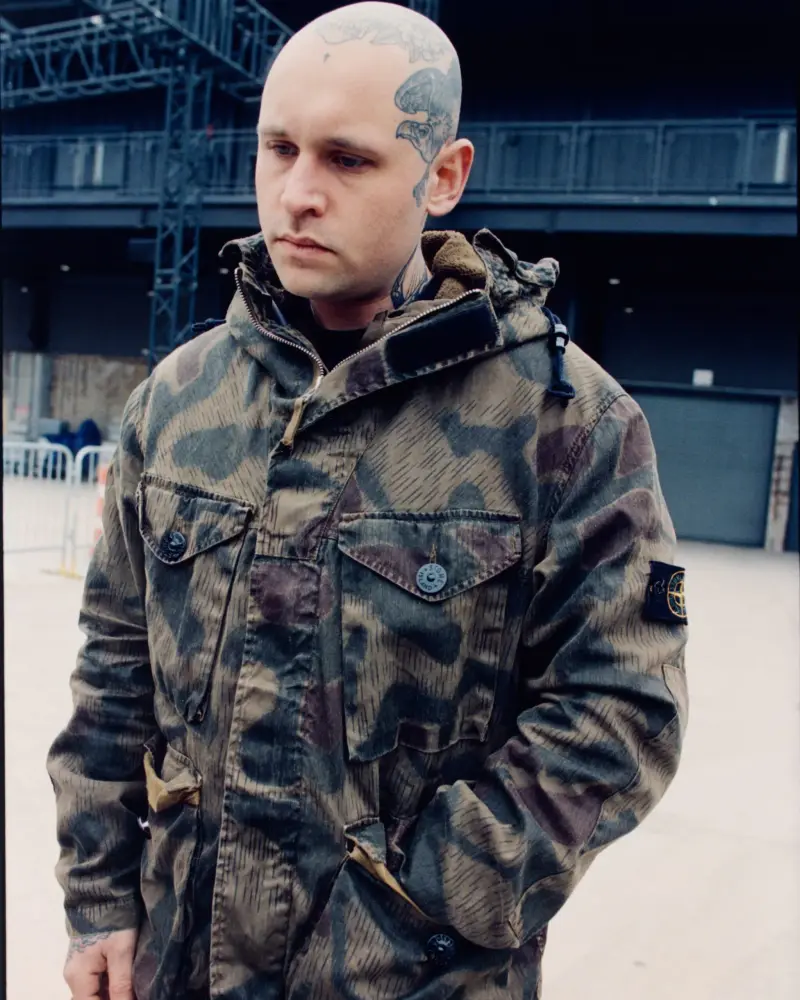 STONE ISLAND HARDCORE SUBCULTURE PROJECT image of photograph collection detailing musicians wearing vintage and modern Stone Island outerwear on tour across North America and Europe. (image 2 of 8)
