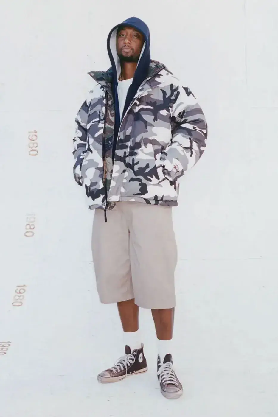 STÜSSY HOLIDAY ’26: PUFFERS, LEATHER AND CAMO PANTS image of the Stüssy Holiday ’26 collection, with outerwear and camouflage trousers, on sale October 23, 2026 at Chapter stores and online. (image 6 of 6)