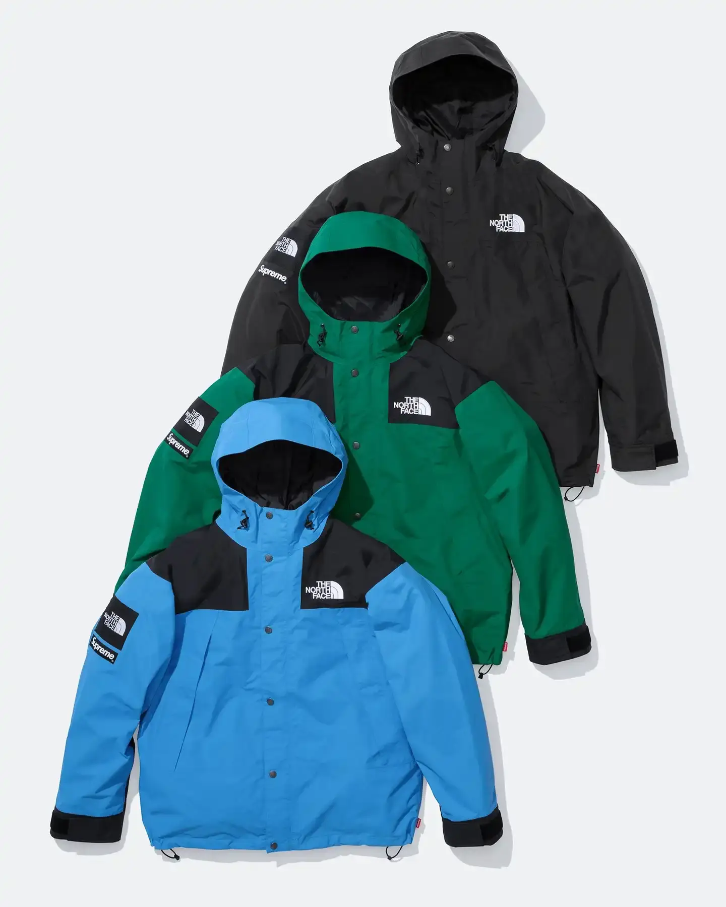 Supreme and The North Face Fall/Winter 2024 collection featuring Raymond Pettibon artwork. Includes Nuptse and Mountain Jacket models with Pettibon designs. Collection launches October 17th online and in stores. Possibly last collaboration before Supreme's acquisition by EssilorLuxottica. Streetwear capsule includes jackets, hoodies, t-shirts, and beanies with Heatseeker Eco technology (image 3 of 5)