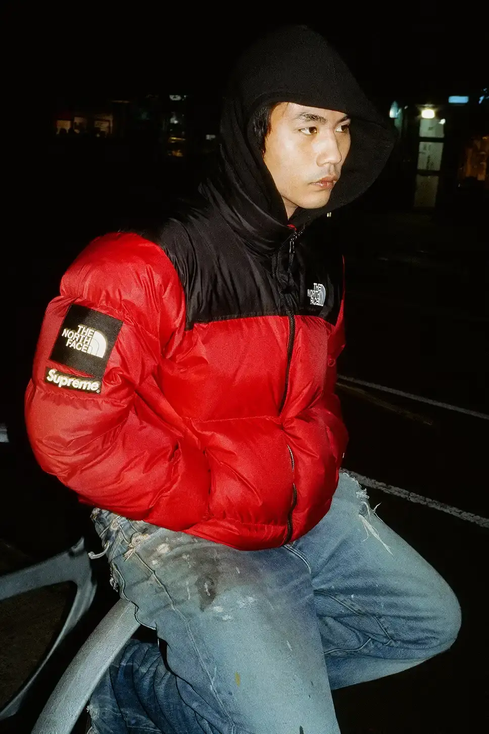 Supreme and The North Face Fall/Winter 2024 collection featuring Raymond Pettibon artwork. Includes Nuptse and Mountain Jacket models with Pettibon designs. Collection launches October 17th online and in stores. Possibly last collaboration before Supreme's acquisition by EssilorLuxottica. Streetwear capsule includes jackets, hoodies, t-shirts, and beanies with Heatseeker Eco technology