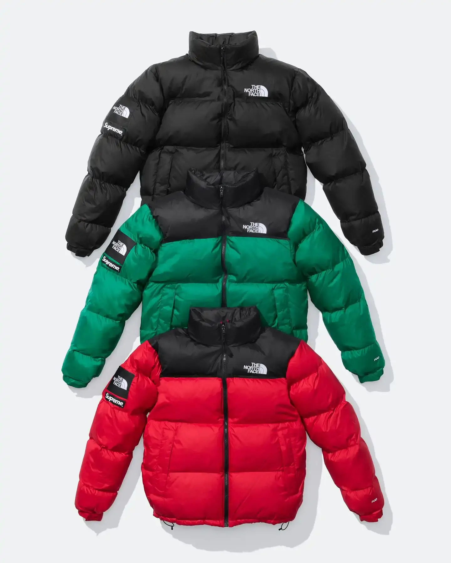 Supreme and The North Face Fall/Winter 2024 collection featuring Raymond Pettibon artwork. Includes Nuptse and Mountain Jacket models with Pettibon designs. Collection launches October 17th online and in stores. Possibly last collaboration before Supreme's acquisition by EssilorLuxottica. Streetwear capsule includes jackets, hoodies, t-shirts, and beanies with Heatseeker Eco technology (image 2 of 5)