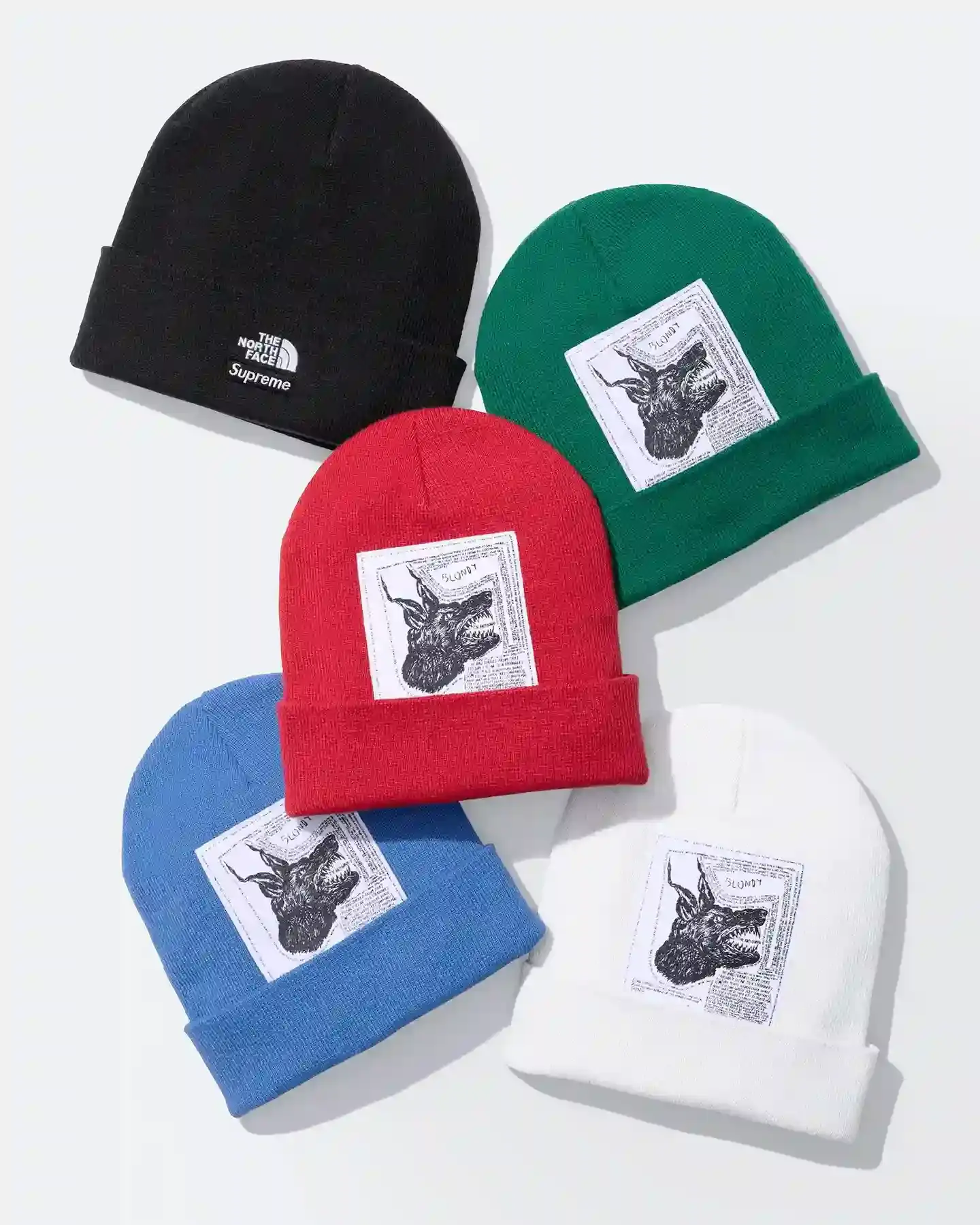 Supreme and The North Face Fall/Winter 2024 collection featuring Raymond Pettibon artwork. Includes Nuptse and Mountain Jacket models with Pettibon designs. Collection launches October 17th online and in stores. Possibly last collaboration before Supreme's acquisition by EssilorLuxottica. Streetwear capsule includes jackets, hoodies, t-shirts, and beanies with Heatseeker Eco technology (image 4 of 5)