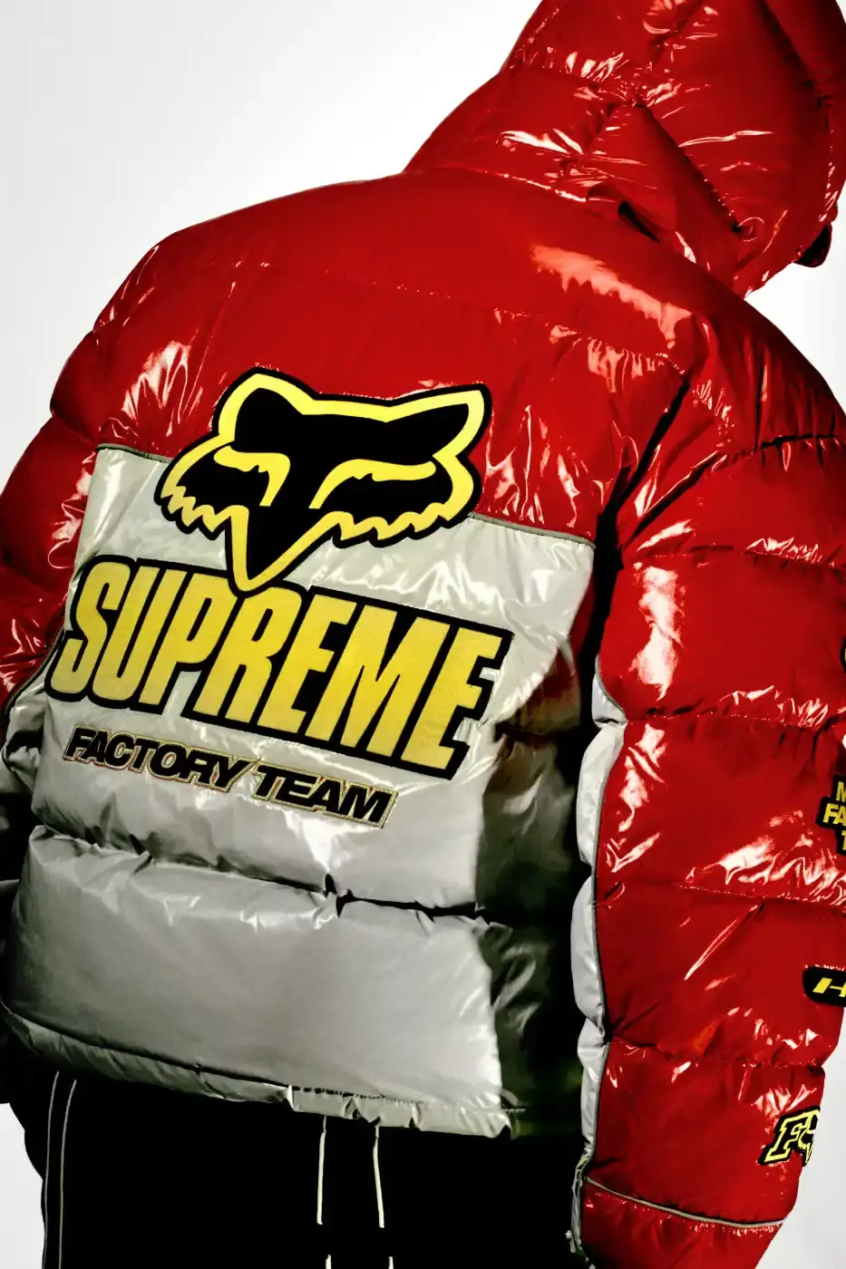 SUPREME X FOX RACING FALL 2025 DROP Supreme collaborates with Fox Racing on a Fall 2025 collection that includes motorsport gear and apparel, featuring tribute pieces to DMX with racing jerseys, helmets, and protective gear in gray camo print with red accents. (image 2 of 26)