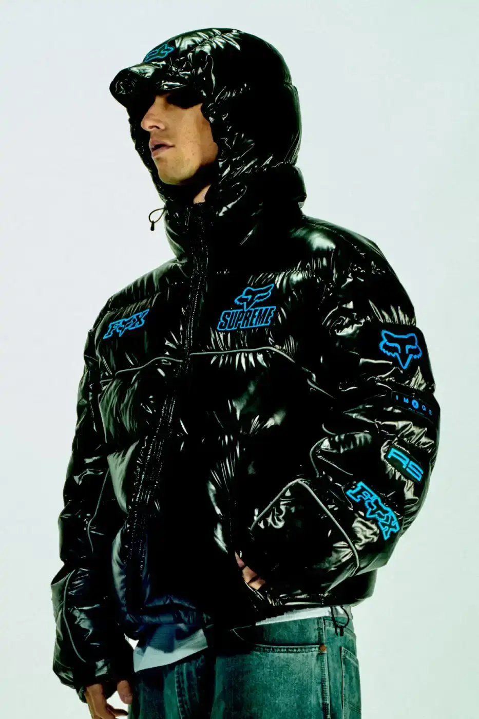 SUPREME X FOX RACING FALL 2025 DROP Supreme collaborates with Fox Racing on a Fall 2025 collection that includes motorsport gear and apparel, featuring tribute pieces to DMX with racing jerseys, helmets, and protective gear in gray camo print with red accents. (image 26 of 26)