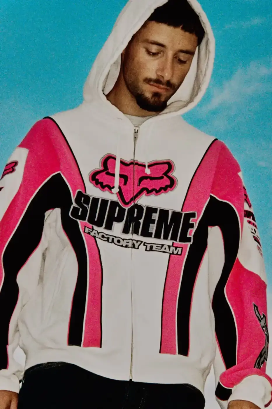 SUPREME X FOX RACING FALL 2025 DROP Supreme collaborates with Fox Racing on a Fall 2025 collection that includes motorsport gear and apparel, featuring tribute pieces to DMX with racing jerseys, helmets, and protective gear in gray camo print with red accents. (image 16 of 26)