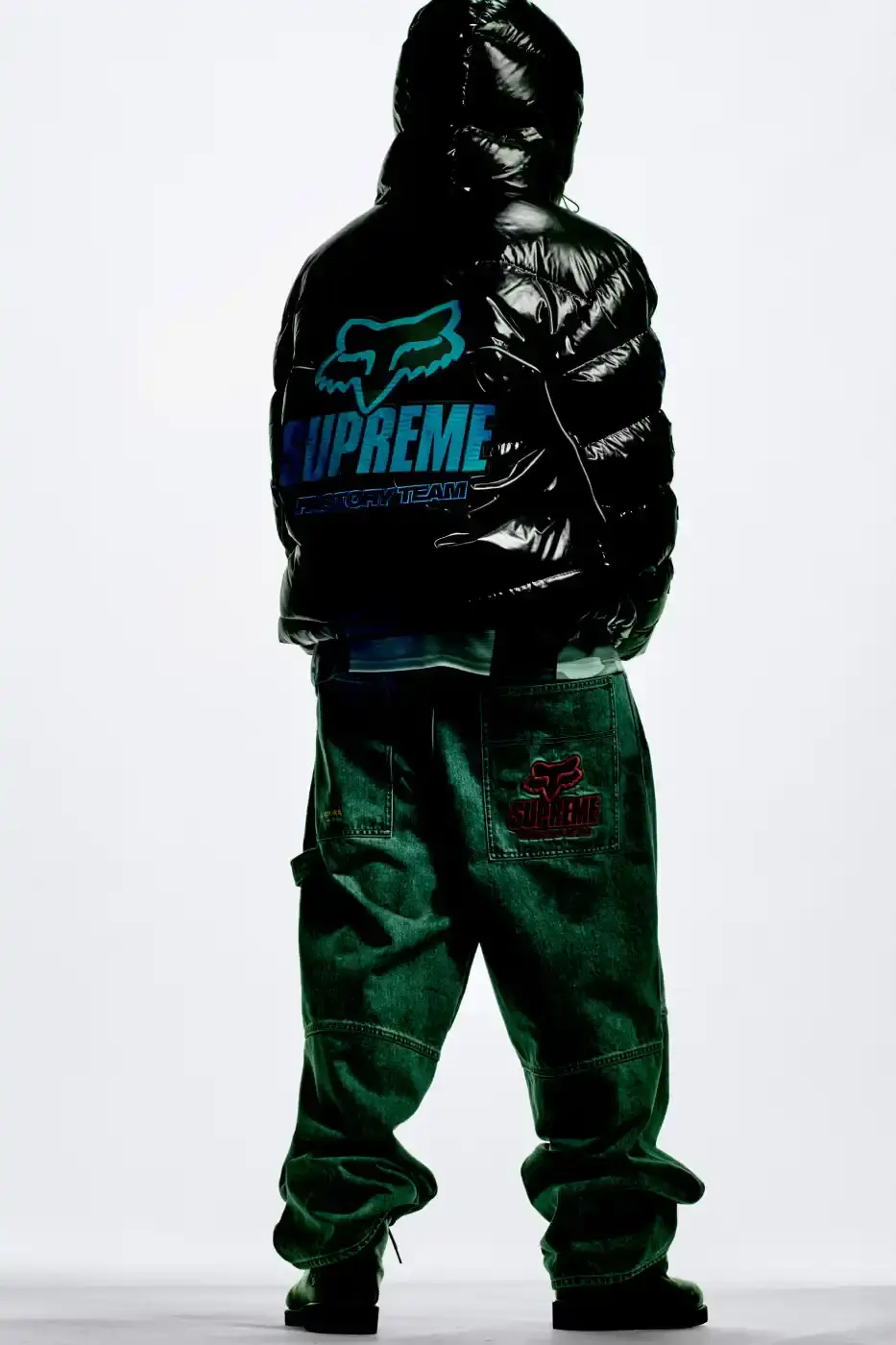 SUPREME X FOX RACING FALL 2025 DROP Supreme collaborates with Fox Racing on a Fall 2025 collection that includes motorsport gear and apparel, featuring tribute pieces to DMX with racing jerseys, helmets, and protective gear in gray camo print with red accents. (image 25 of 26)