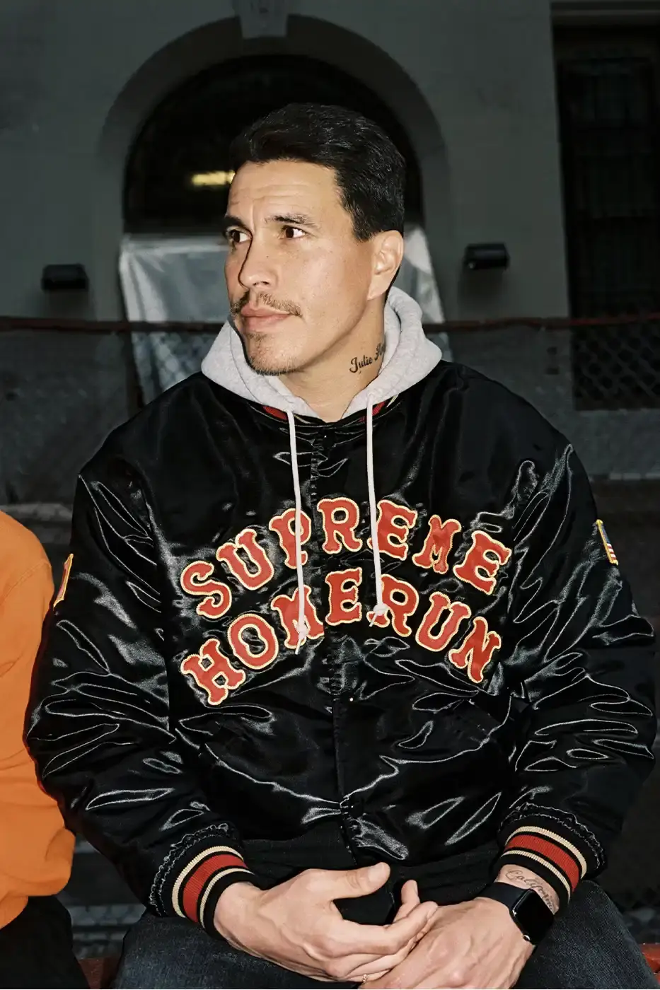 SUPREME PARTNERS WITH HOMERUN FOR BASEBALL-INSPIRED COLLECTION image of the Spring 2025 collaboration between Supreme and Homerun, a brand based in both New York City and Tokyo. The collection features baseball-inspired apparel including varsity jackets in silver and black, baseball jerseys in teal, navy, and pinstriped designs, plus hooded sweatshirts, t-shirts, and New Era caps. All items display co-branding with Homerun's cartoon graphics and "Non Stop" motto. The collection launches May 15 globally and May 17 in Asia through Supreme's website and stores. (image 8 of 14)