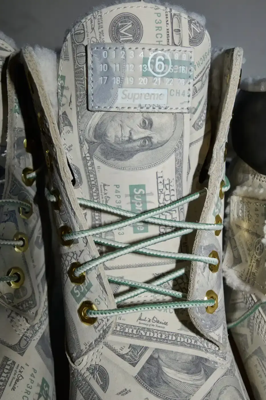 SUPREME AND MM6 MAISON MARGIELA SPRING 2026 image of the Spring 2026 clothing collection released by Supreme and MM6 Maison Margiela detailing specific garments and accessories. (image 3 of 39)