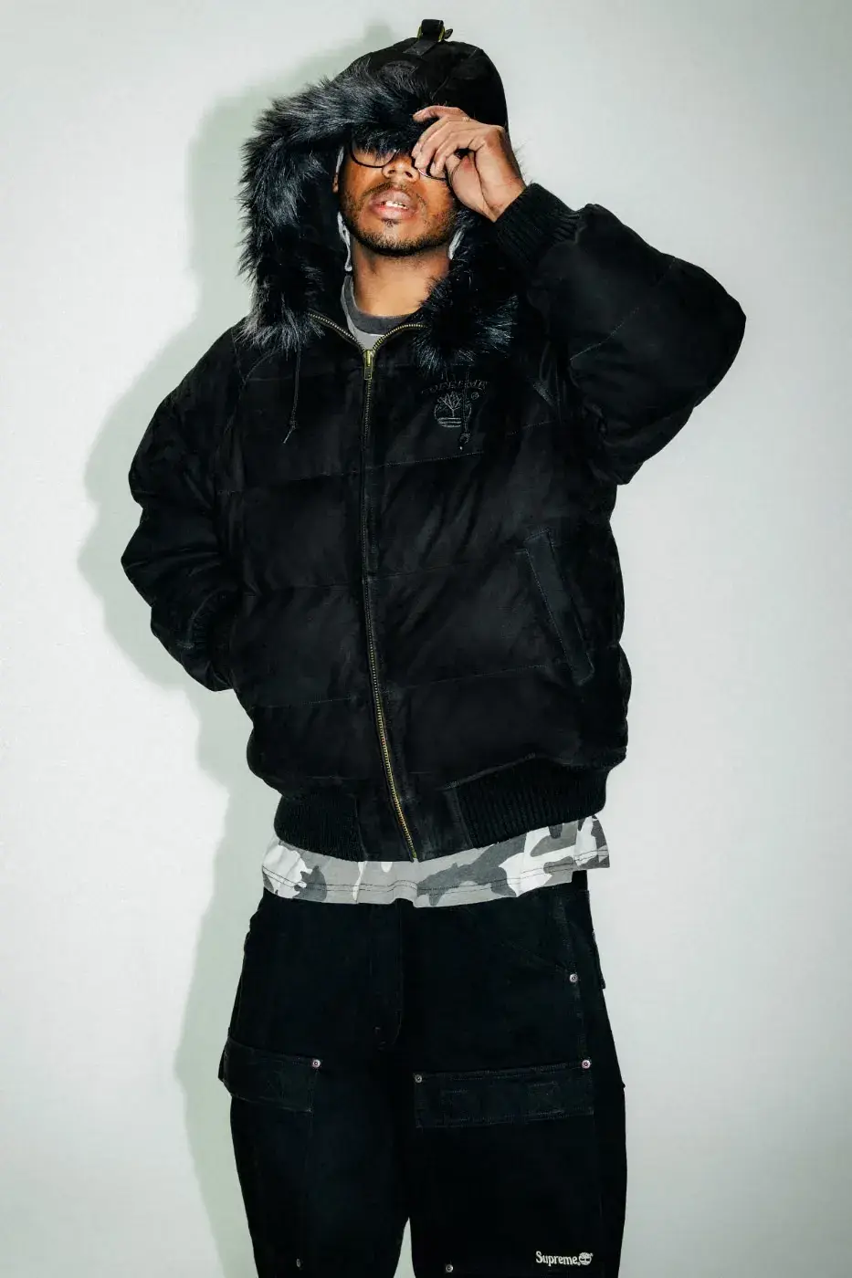 SUPREME X TIMBERLAND FALL 2026 APPAREL DROPS OCTOBER 22 Text summary of an article about the Supreme and Timberland Fall 2026 collection, which includes jackets, tops, pants and headwear and releases on October 22 and October 24. (image 3 of 19)