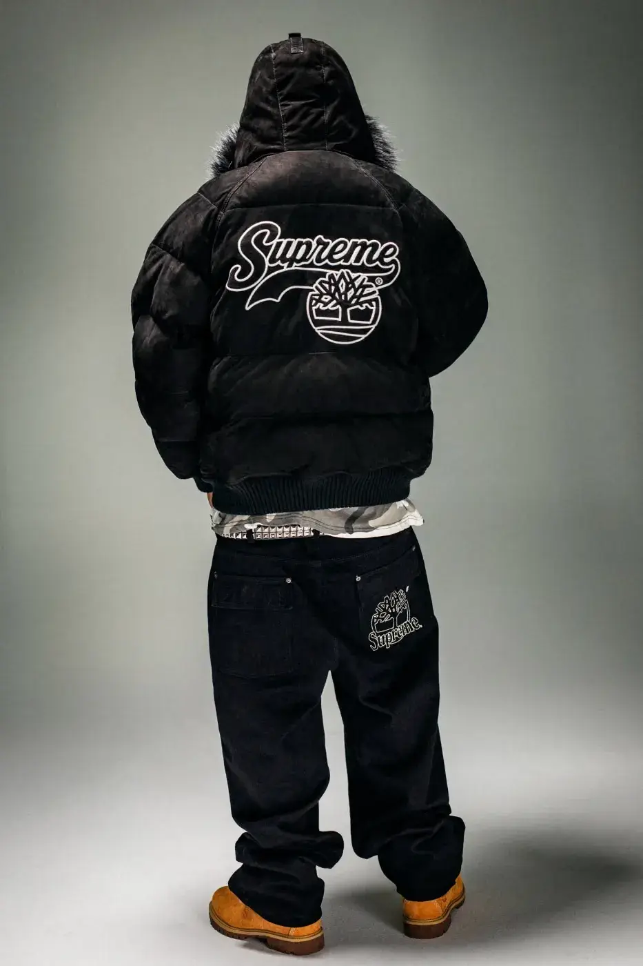 SUPREME X TIMBERLAND FALL 2026 APPAREL DROPS OCTOBER 22 Text summary of an article about the Supreme and Timberland Fall 2026 collection, which includes jackets, tops, pants and headwear and releases on October 22 and October 24. (image 4 of 19)