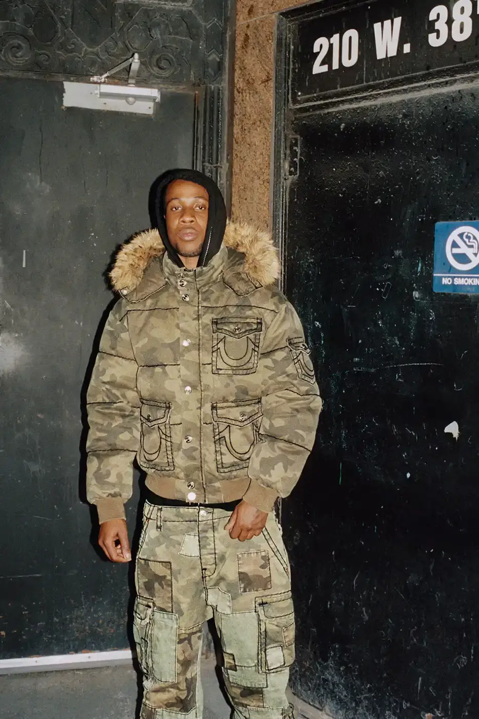 SUPREME TEAMS WITH TRUE RELIGION FOR FALL 2025 Supreme and True Religion announce a Fall 2025 collaboration featuring denim and leather outerwear, hoodies, accessories, and signature horseshoe logo details, releasing November 20, 2025. (image 4 of 15)