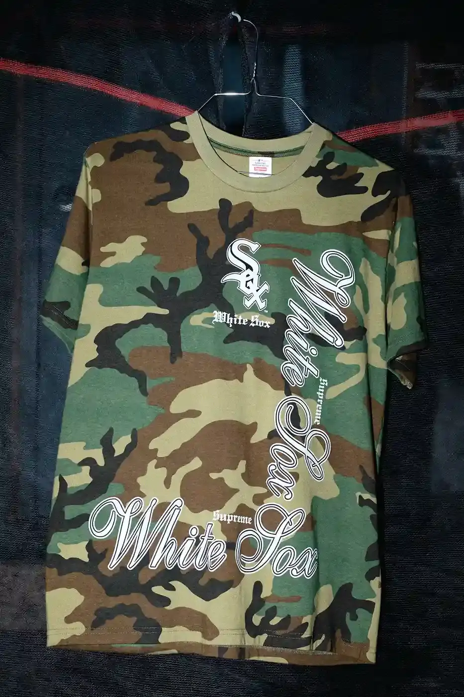 SUPREME WINTER 2025 TEES DROP NEXT WEEK Supreme announces Winter 2025 tees collection with seven designs, including MLB Boston White Sox collaboration, graffiti logo print, and holiday-themed graphics, releasing December 18. (image 6 of 10)