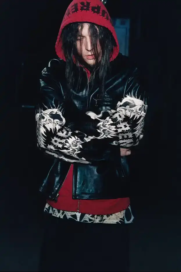 SUPREME X Y'S YAMAMOTO FALL 2025 COLLECTION Fashion collaboration image describing Supreme and Y's by Yohji Yamamoto Fall 2025 collection featuring punk aesthetics and skull designs.