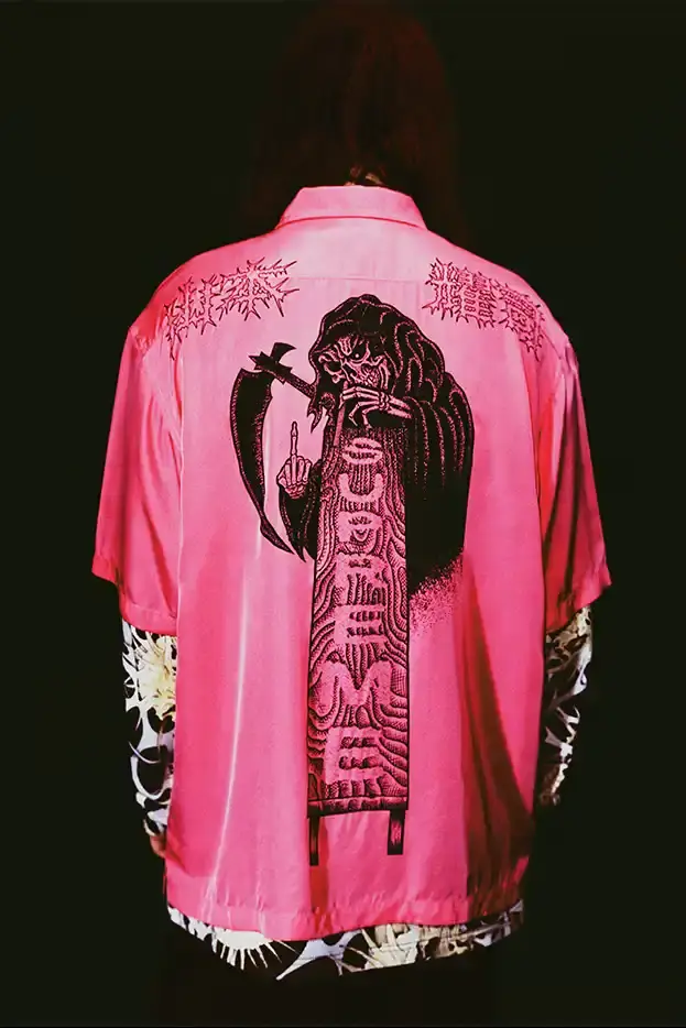 SUPREME X Y'S YAMAMOTO FALL 2025 COLLECTION Fashion collaboration image describing Supreme and Y's by Yohji Yamamoto Fall 2025 collection featuring punk aesthetics and skull designs. (image 10 of 20)