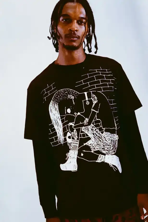 SUPREME X Y'S YAMAMOTO FALL 2025 COLLECTION Fashion collaboration image describing Supreme and Y's by Yohji Yamamoto Fall 2025 collection featuring punk aesthetics and skull designs. (image 4 of 20)