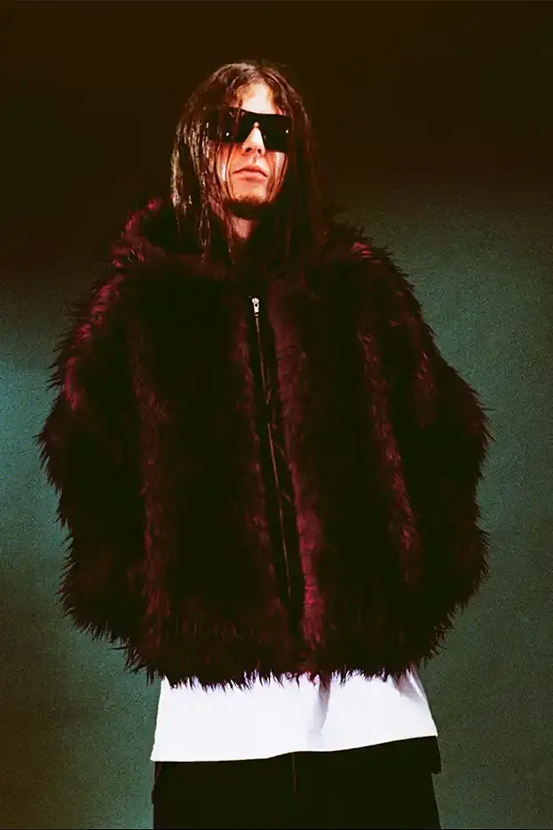 SUPREME X Y'S YAMAMOTO FALL 2025 COLLECTION Fashion collaboration image describing Supreme and Y's by Yohji Yamamoto Fall 2025 collection featuring punk aesthetics and skull designs. (image 16 of 20)