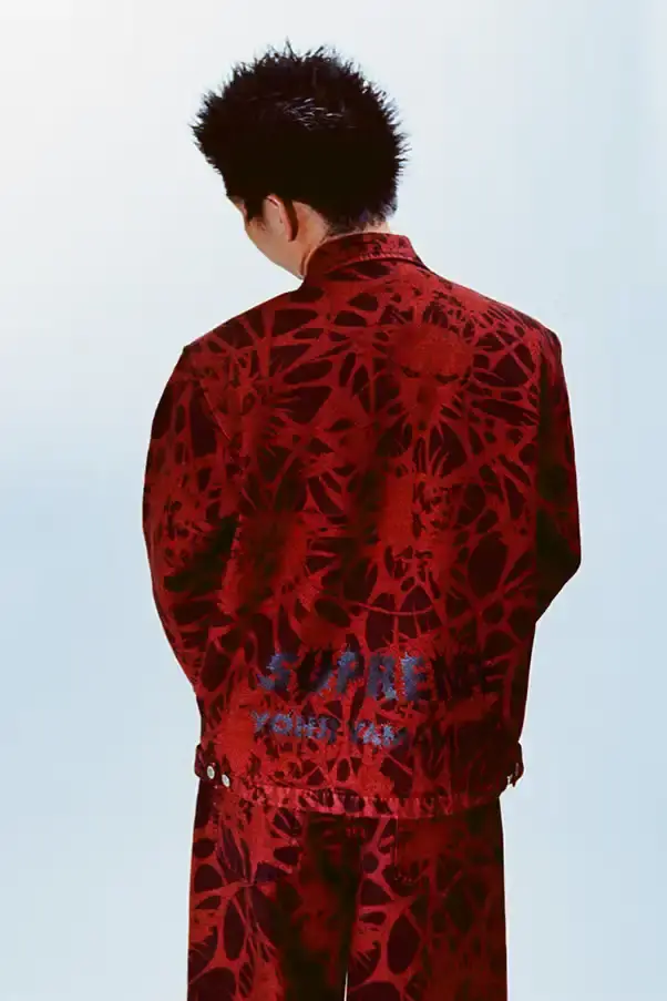 SUPREME X Y'S YAMAMOTO FALL 2025 COLLECTION Fashion collaboration image describing Supreme and Y's by Yohji Yamamoto Fall 2025 collection featuring punk aesthetics and skull designs. (image 13 of 20)