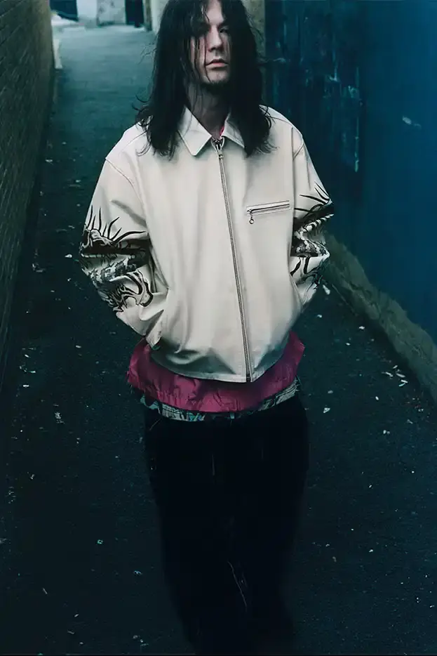 SUPREME X Y'S YAMAMOTO FALL 2025 COLLECTION Fashion collaboration image describing Supreme and Y's by Yohji Yamamoto Fall 2025 collection featuring punk aesthetics and skull designs. (image 17 of 20)