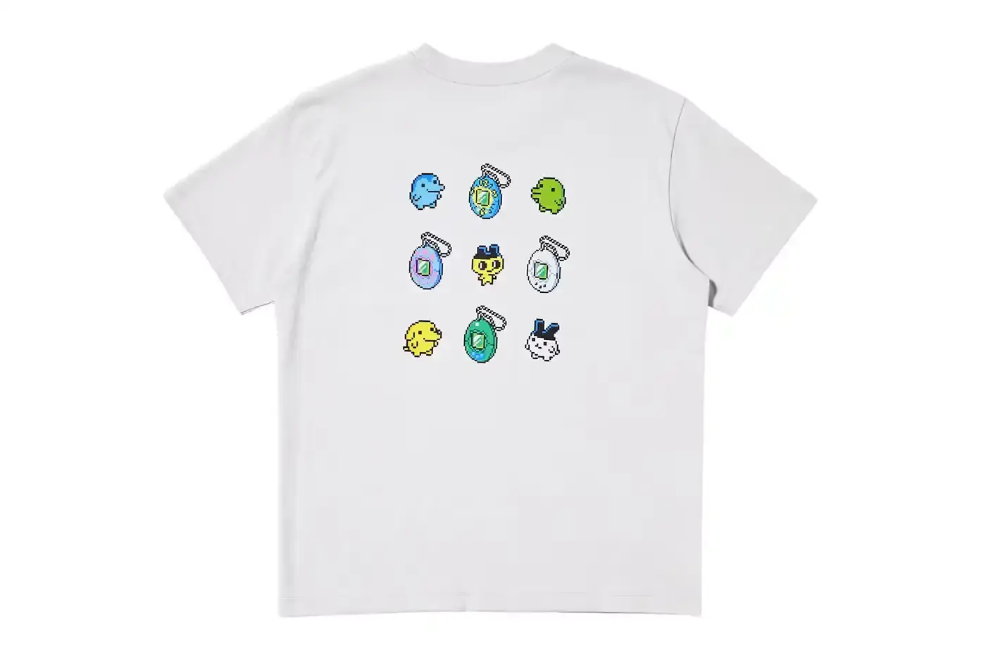 TAMAGOTCHI MARKS 30 YEARS WITH UNIQLO LINE Bandai and UNIQLO release a Tamagotchi anniversary collection featuring T-shirts and a limited-edition device shell with clock design and red accents. (image 5 of 9)