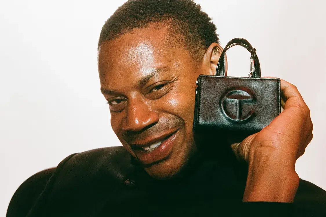 A product description and release announcement for a miniature version of the Telfar shopping bag, detailing design specifications, colors, and pricing.