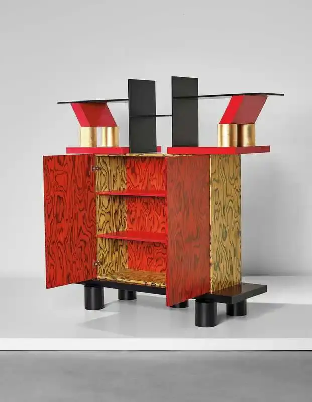 Article wrote by Monica Picchi about the revival of Memphis-style decorative wood veneer, featuring colorful, psychedelic wood grain patterns pioneered by Ettore Sottsass in the 1980s and recently popularized by designers like Sabine Marcelis and Martino Gamper. The technique involves dyeing thin slices of wood to create bold, expressive patterns for furniture and interior design elements. (image 8 of 12)