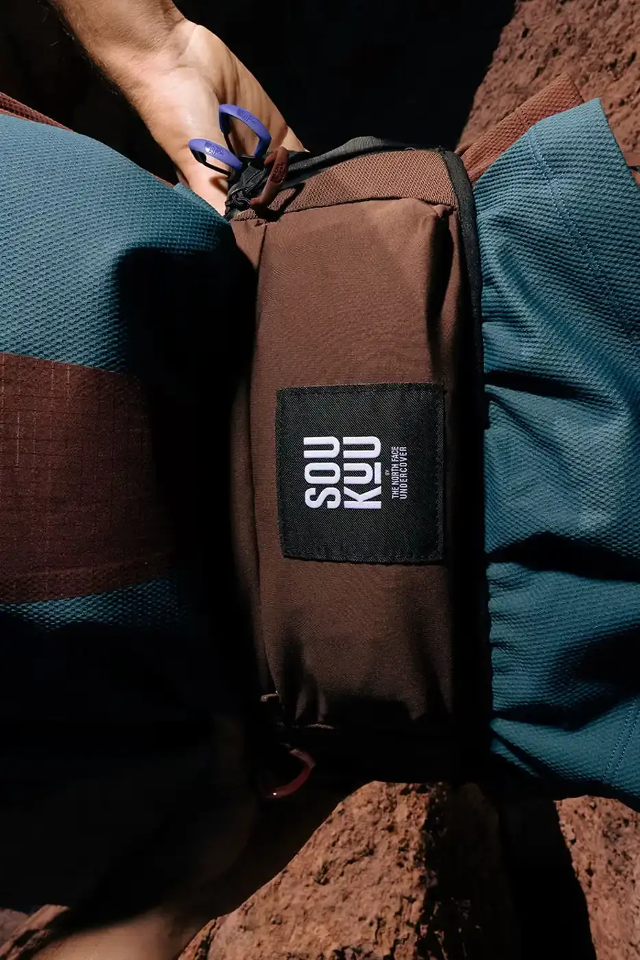 THE NORTH FACE AND UNDERCOVER LAUNCH SEASON FOUR OF SOUKUU LINE photo of the fourth season of the SOUKUU collaboration between The North Face and UNDERCOVER. It describes the Spring/Summer 2025 collection's technical features including waterproof materials, convertible zip-off designs, and VECTIV footwear technology. The article mentions the April 10 release date and notes that items will be available on The North Face's official website. The content is presented in a straightforward news format with information about the collection's components and performance features. (image 2 of 21)