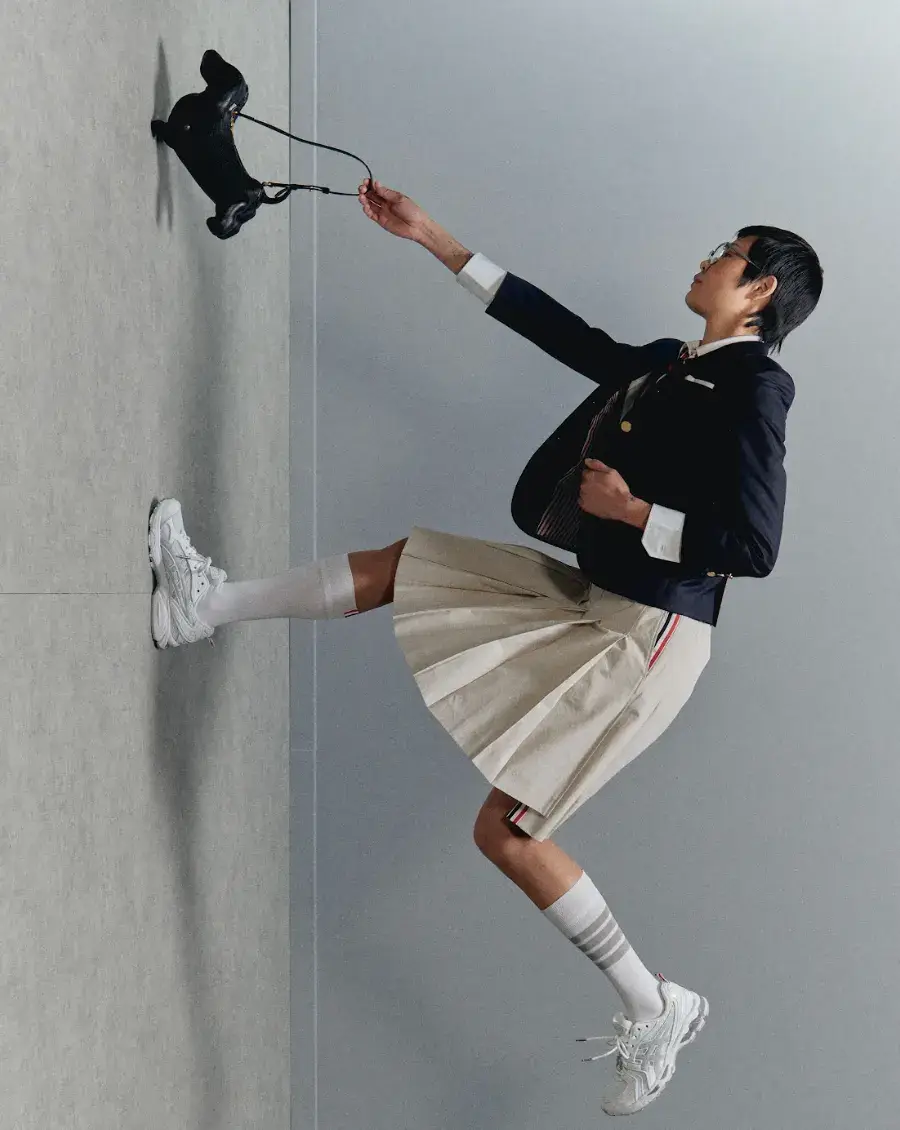 THOM BROWNE AND ASICS REWORK THE GEL-KAYANO 14 image describing the Thom Browne x ASICS GEL-KAYANO 14 collaboration, covering design details, materials, availability, and background on both brands.