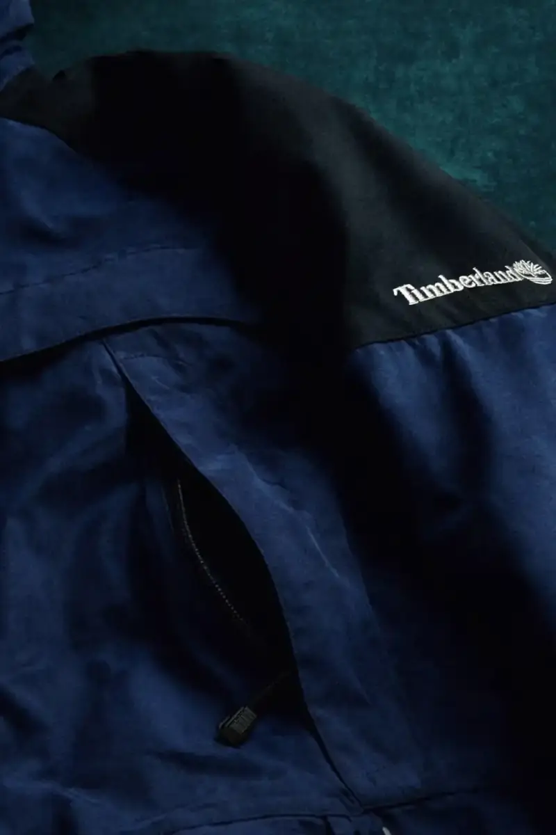 TIMBERLAND BRINGS BACK 1997 AND 2000 ARCHIVE JACKETS Timberland rereleases two archive jackets from 1997 and 2000. The Granite State Waterproof Rain Jacket costs $270 and the Welch Mountain Leather Puffer costs $1,100. Both are available in limited quantities on Timberland's website. (image 7 of 8)