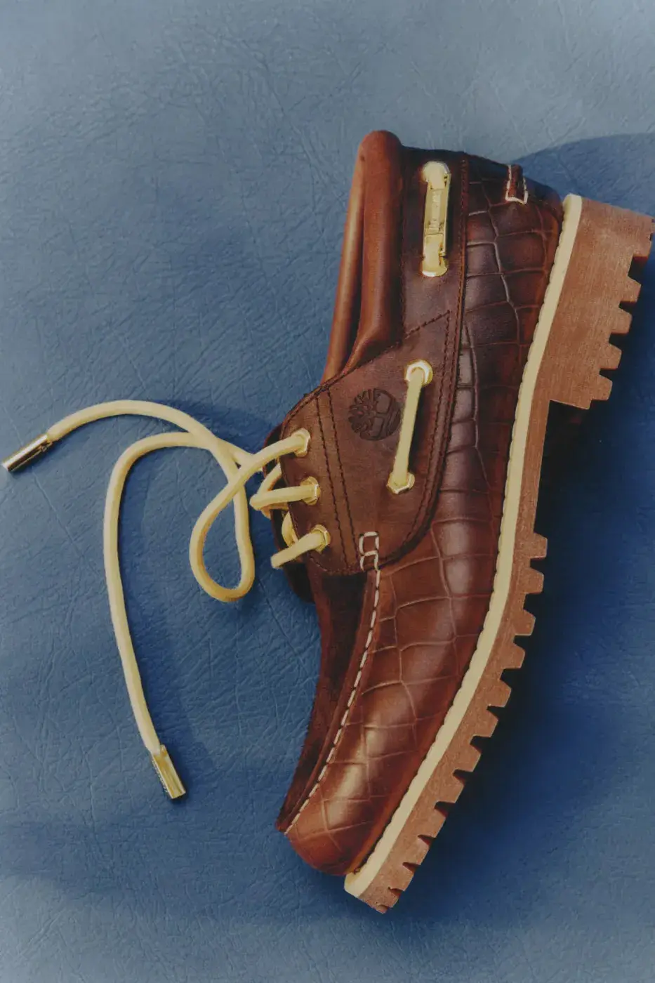 TIMBERLAND X JACQUEMUS BOAT SHOE IN CROC-EMBOSSED LEATHER image of Timberland x Jacquemus Authentic Boat Shoe in Brown Croc and Navy Croc, both made from crocodile-embossed leather with a rubber outsole. (image 4 of 9)