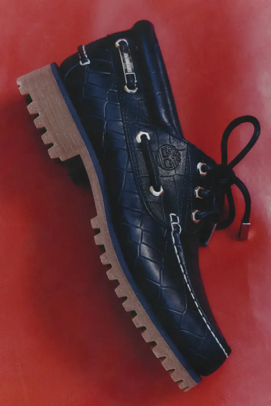 TIMBERLAND X JACQUEMUS BOAT SHOE IN CROC-EMBOSSED LEATHER image of Timberland x Jacquemus Authentic Boat Shoe in Brown Croc and Navy Croc, both made from crocodile-embossed leather with a rubber outsole. (image 8 of 9)